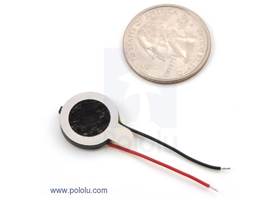 16mm speaker with a quarter
